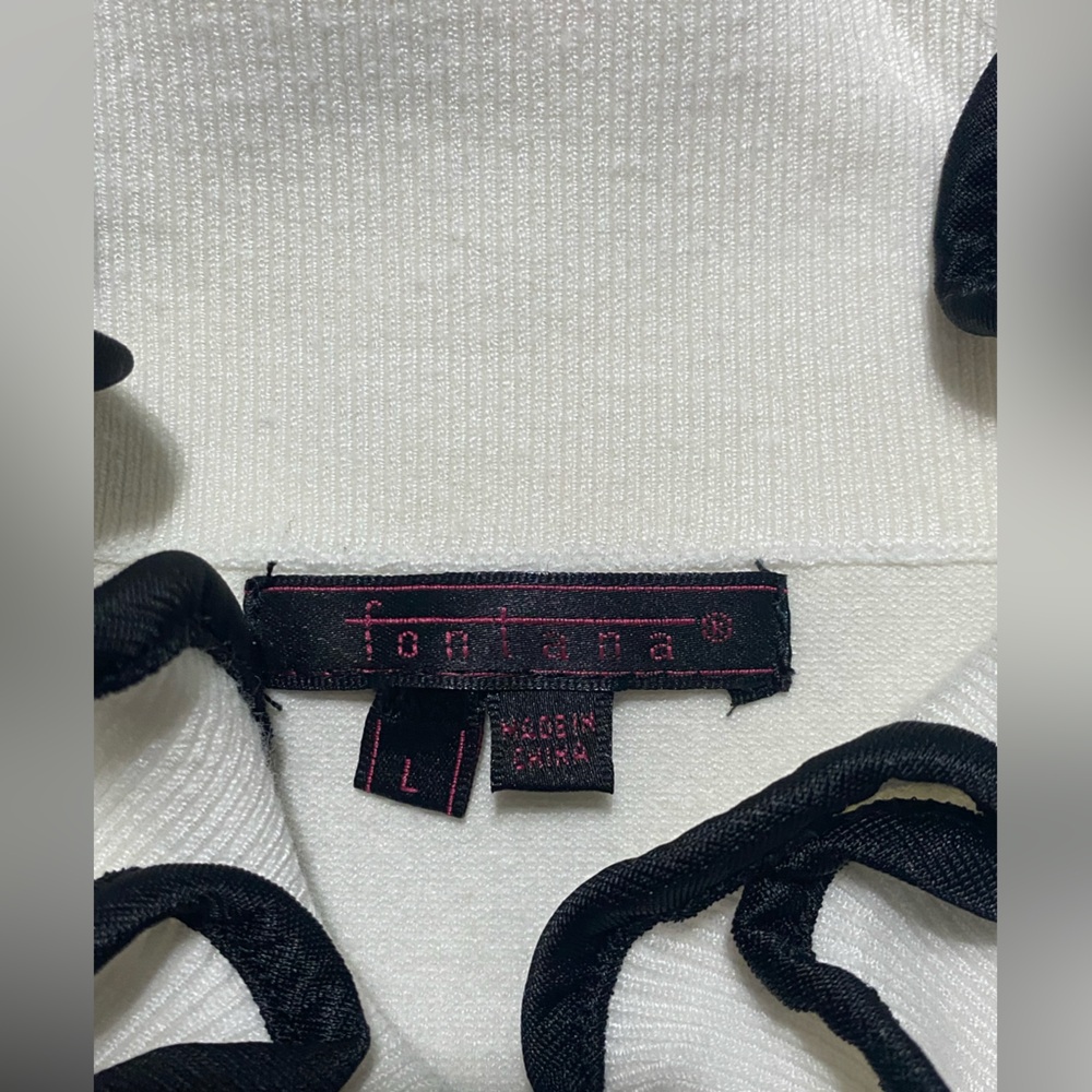 Elegant White Sleeveless Top with Black Trim by Fontana - Picture 4 of 6